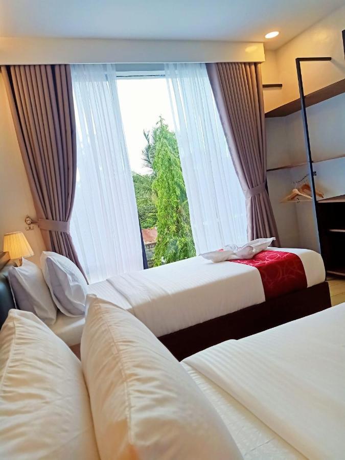 Inncity Hotel Калбайог Экстерьер фото